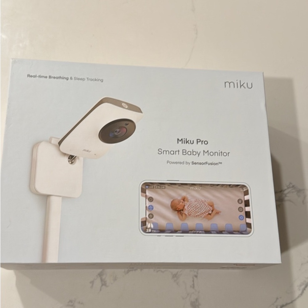 White Mini Pro Baby Monitor Camera with Modern Design. Used twice ever